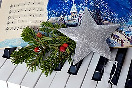 Banner Adventsliedersingen mit besinnlichen Zwischentexten